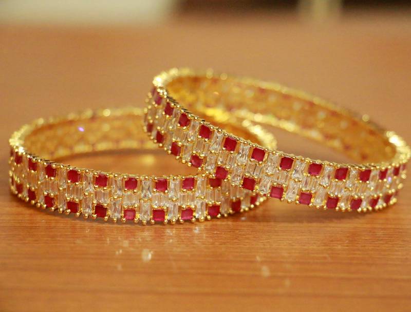 Priyaasi Set Of 2 Gold Plated Ruby Studded Circular Patterns Bangles  24  Buy Priyaasi Set Of 2 Gold Plated Ruby Studded Circular Patterns Bangles   24 Online at Best Price in India  Nykaa
