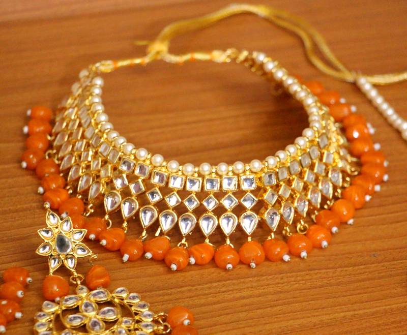 ORANGE CRYSTAL NECKLACE SETS Sanvi Jewels